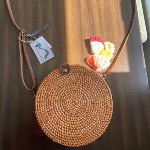 Leather and rattan crossbody bag made in Vietnam